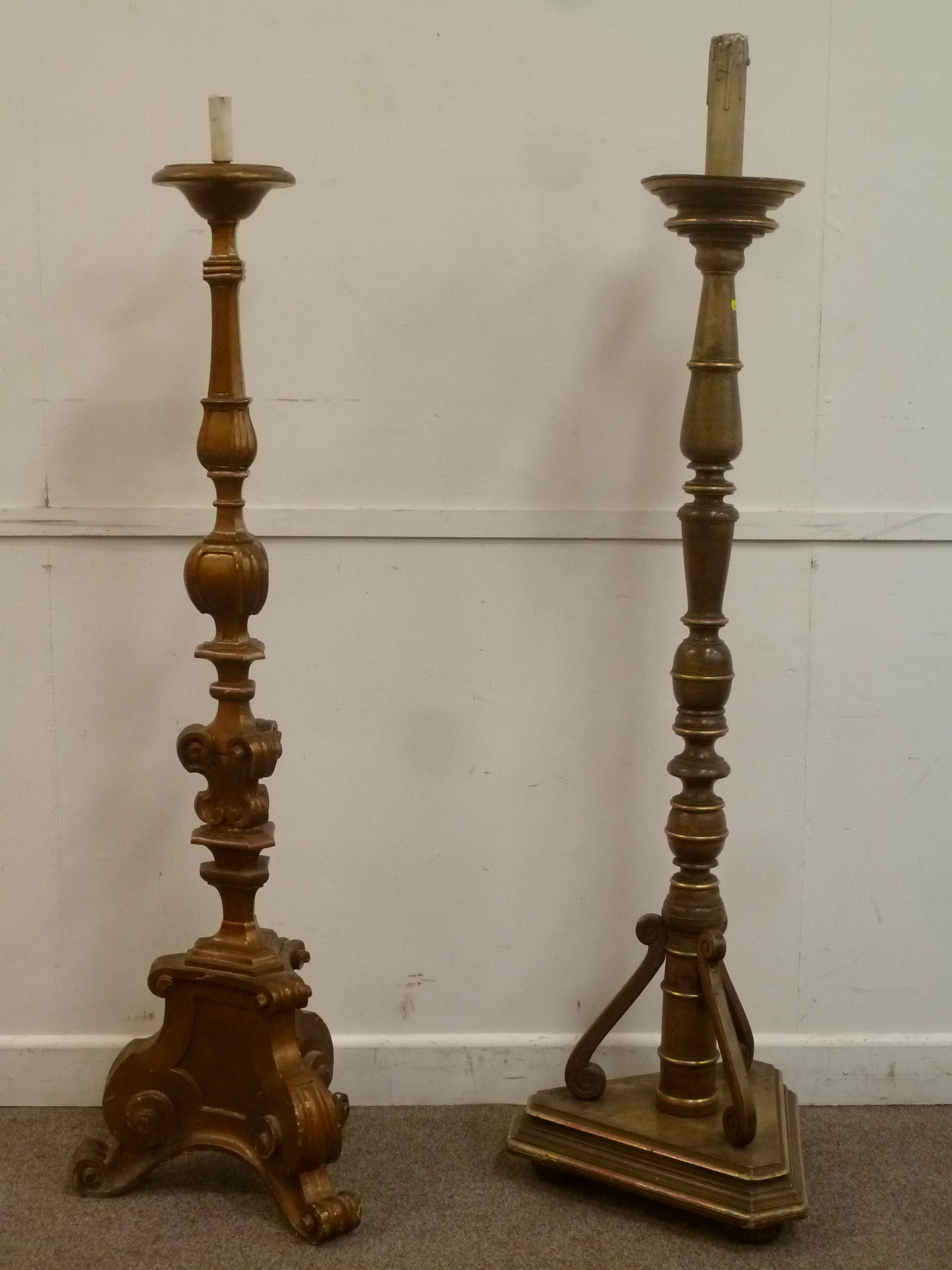 Two turned and painted wood candle stands, H151cm