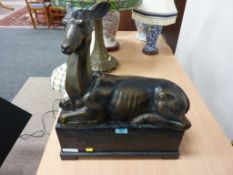 Recumbent antelope in bronzed finish, 52cm high