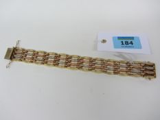 Tri-colour gold four bar gate bracelet stamped 585 approx 39.3gm