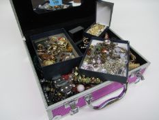 Pink case containing costume jewellery etc