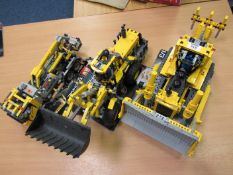 Three Lego Technic models 8292-1 (boxed), 8265 (boxed) and 8275 with instructions