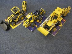 Three Lego Technic models 8455, 8862 and 8459 with instructions