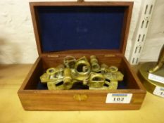 Reproduction Nazi German brass submarine compass, in a brass inlaid walnut box