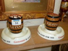 Two Guiness matchbox stands