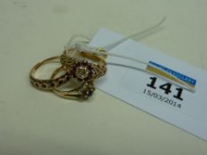 Three gold rings set with rubies and sapphires hallmarked 9ct