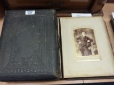 Two Victorian leather bound photograph albums containing portraits including an example from the