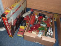 A box of Matchbox, Corgi and other toy cars together with a boxed Champion Motor Racing game