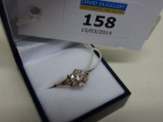 Diamond flower set ring hallmarked 9ct size K
