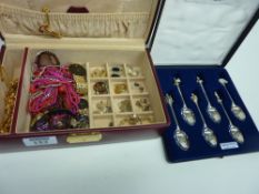 Costume jewellery, his and her's Accurist watches and commemorative spoons in two boxes