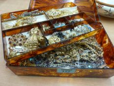 Costume jewellery in plastic tortoiseshell box