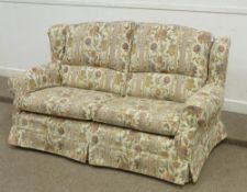 Two seat wing back settee in natural floral 'tapestry' cover with feather back cushions and matching