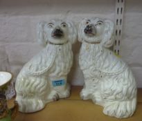 Pair of 19th Century Staffordshire pottery spaniels with moulded fur