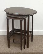 Early 20th Century mahogany oval nest of three tables