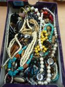 Necklaces, beads and costume jewellery in one box