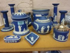 Collection of Wedgwood blue Jasperware items, to include candlesticks, a jardiniere and pots