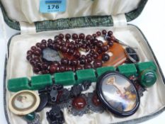 Jet and hardstone brooches, beads etc