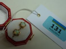 Pair of opal ear-rings stamped 9ct