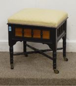 Edwardian ebonised walnut piano stool with upholstered hinged top