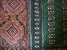 Bokhara green ground rug 190cm x 126cm, and a Persian rug