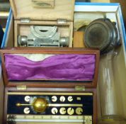 Small cased gilt metal microscope with some slides, 20th Century, Microtecnica level (cased), Loftus