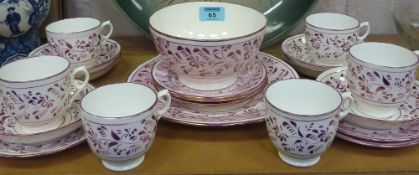 Six 19th Century porcelain and lustre tea cups and saucers, side plates, a bread plate and slop