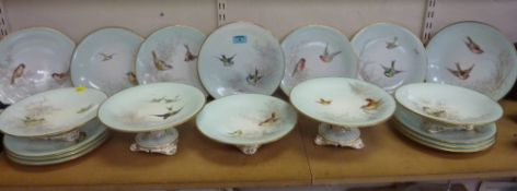 Porcelain dessert service painted with wild birds on pale blue ground, late 19th/ early 20th