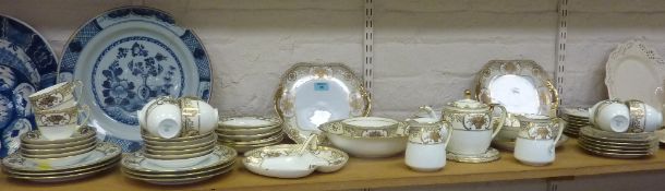 Noritake gilt and white part dinner service and tea service