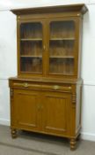 Victorian stained and grained pine cabinet fitted with two drawers with cupboards below, glazed