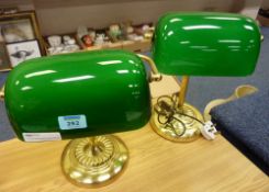 Two gilt metal banker's lamps with green glass shades