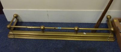 19th Century brass fender with rail supported by spheres