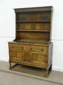 Oak dresser with carved decoration and plate rack