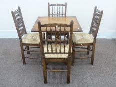 Solid oak square pedestal table 76cm and four Lancashire spindle back chairs with rush seats
