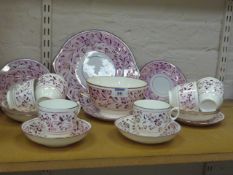 Six 19th Century porcelain and lustre tea cups and saucers, side plates, a bread plate and slop
