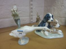 Lladro goose and donkey, Nao dog group and a Kunst boy playing flute