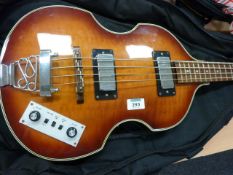 Challenge violin electric bass guitar in the style of a Hofner violin bass guitar played by Paul