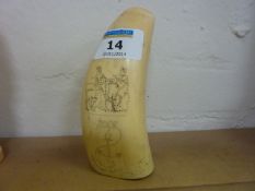 Carved scrimshaw sperm whale tooth