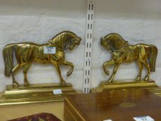 Pair of brass horse fire side ornaments