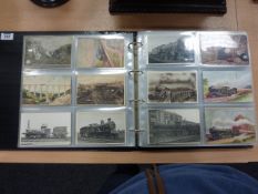 An album containing postcards of trains, stations and other railway views