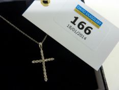 Platinum diamond set cross on chain stamped 750