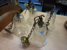 Two pairs of similar Edwardian cut glass and gilt metal pendant ceiling lights