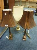 Alabaster table lamp and a pair of bronzed metal Corinthian Column table lamps