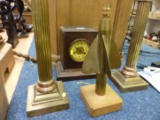 Pair of brass column table lamps, another brass table lamp and a Victorian mantel clock