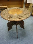 Indian carved wooden circular table with glass top