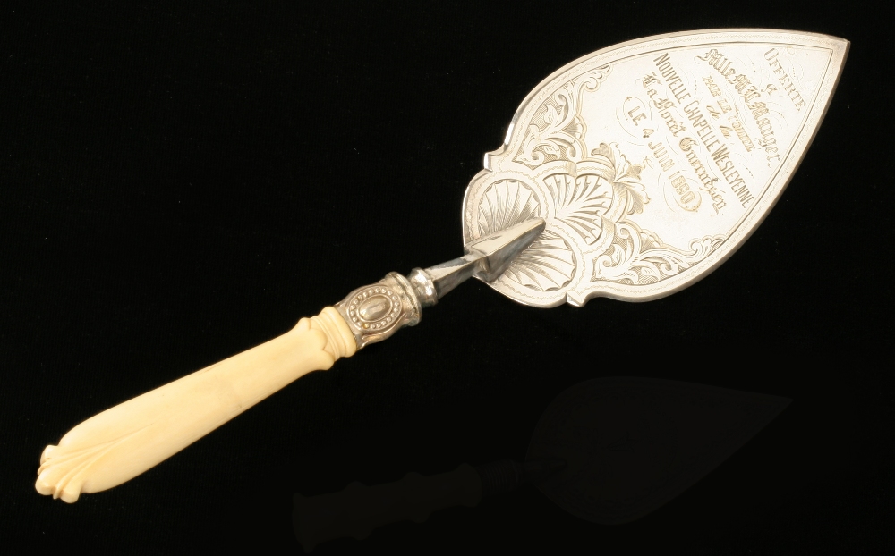An unusual French silver plated presentation trowel with "offerte a Melle. M.U.Mauger par le