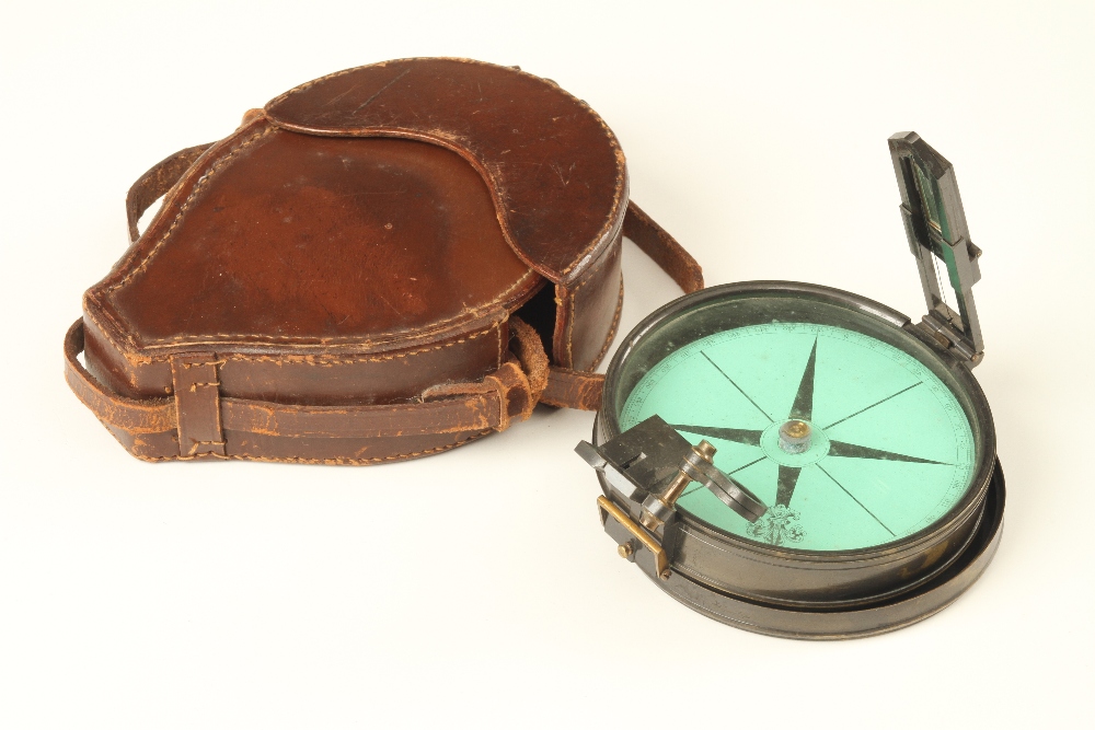 A 4 1/2" prismatic compass by REYNOLDS Birmingham with cover in orig leather case G+