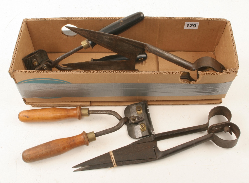Two pairs of clippers and two pairs of shears