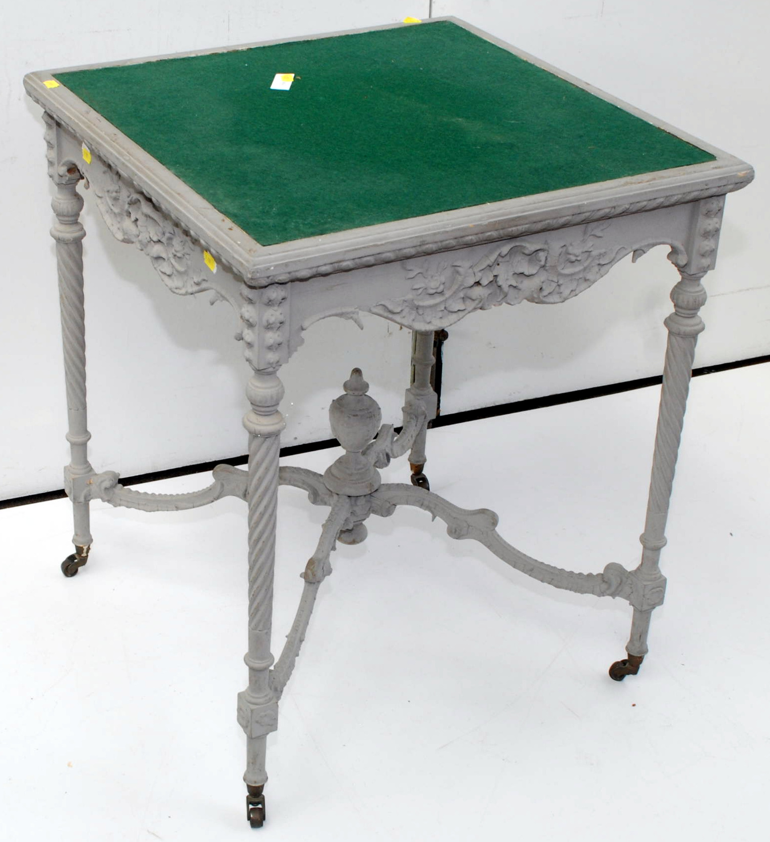 A painted card table.