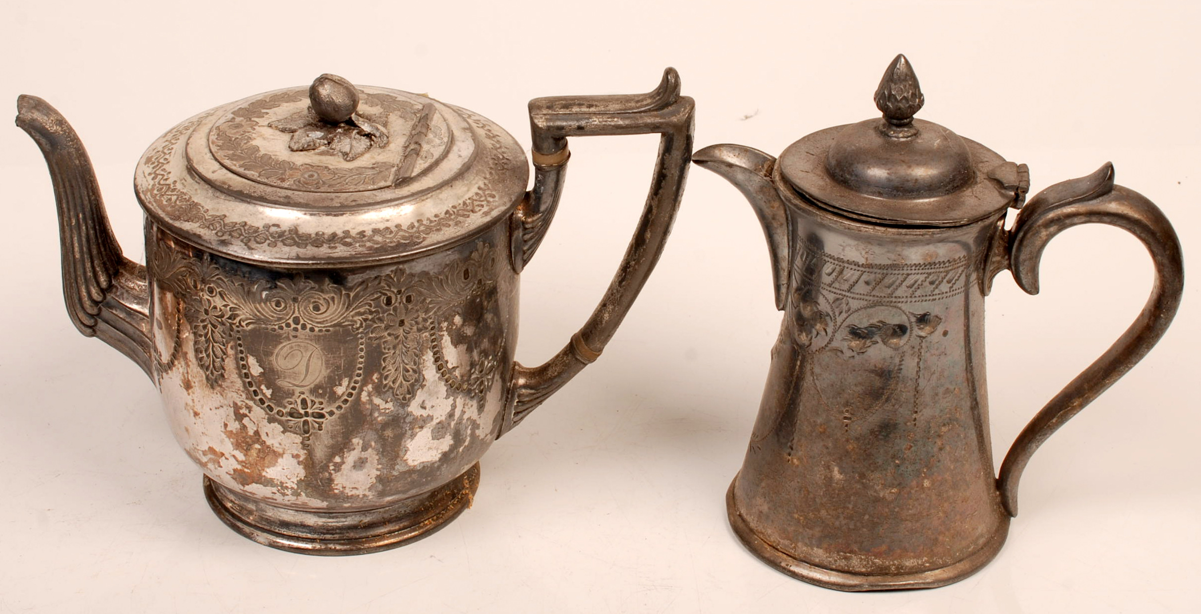 A swag engraved teapot and an EPBM jug.
