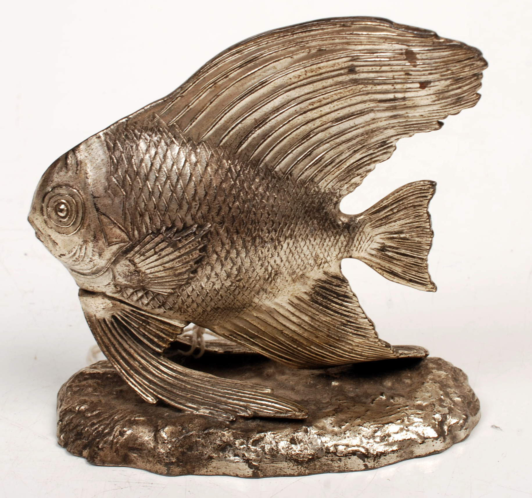 A cast model fish in eastern style, height including oval base 13cm.