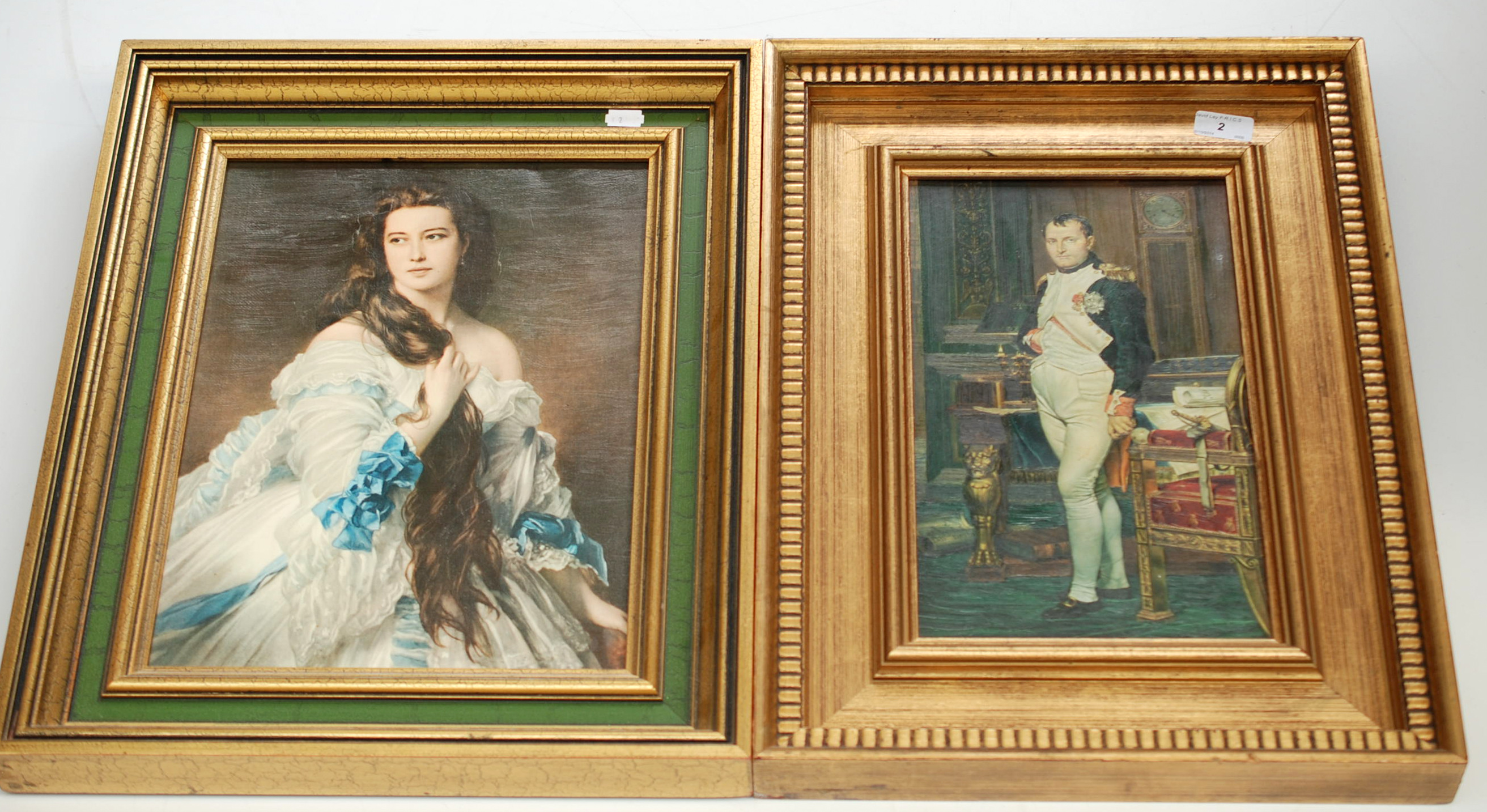 Two oileographs, one of Napoleon, the other a lady in early 18th century dress.